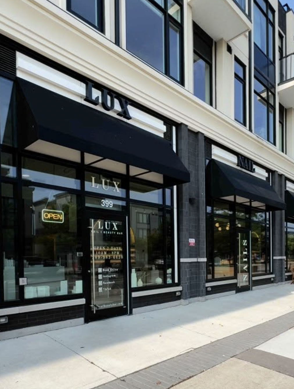 Exterior storefront of LUX Beauty Bar in Grimsby, Ontario.